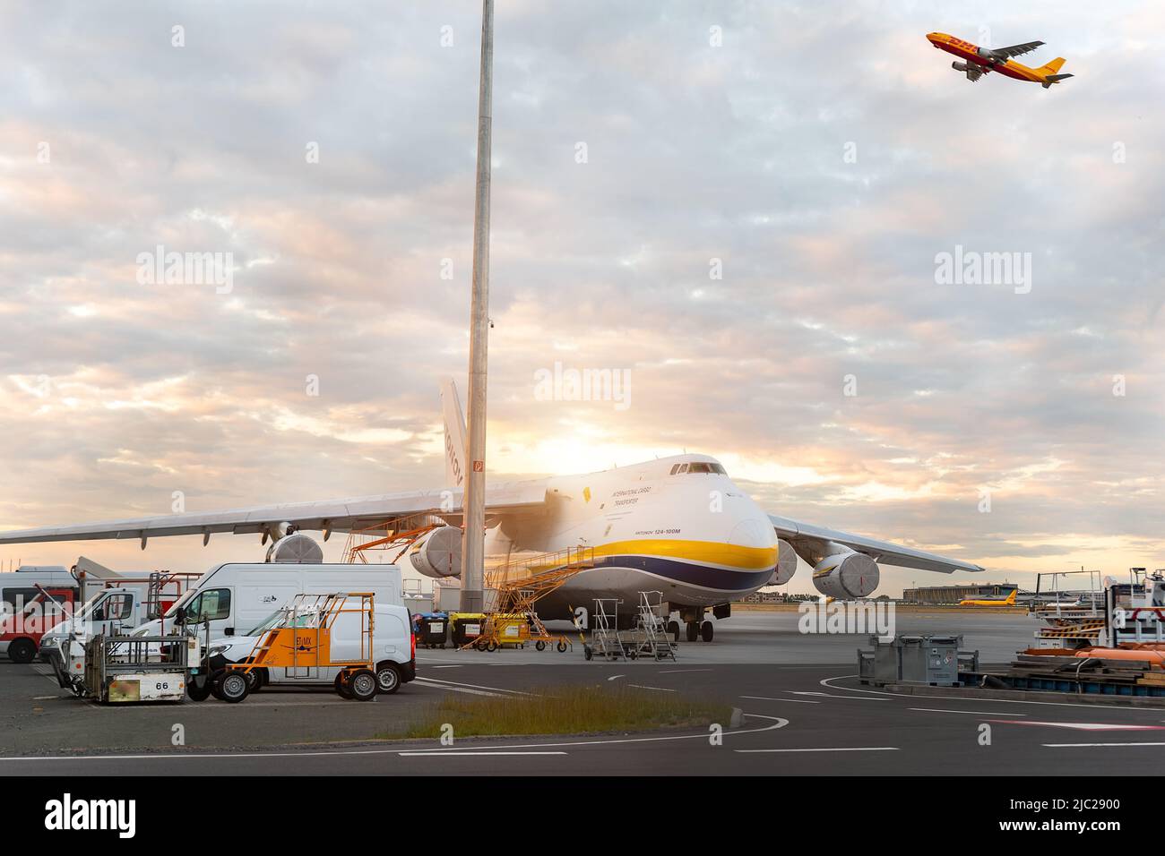 Schkeuditz, Germany - 29th May, 2022 - Large An-124-100 ukrainian Ruslan Antonov cargo jet parked on Leipzig Halle airport terminal tarmac apron for Stock Photo