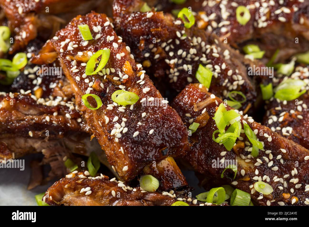 Homemade Spicy Asian Baby Back Ribs with Sesame and Green Onions Stock