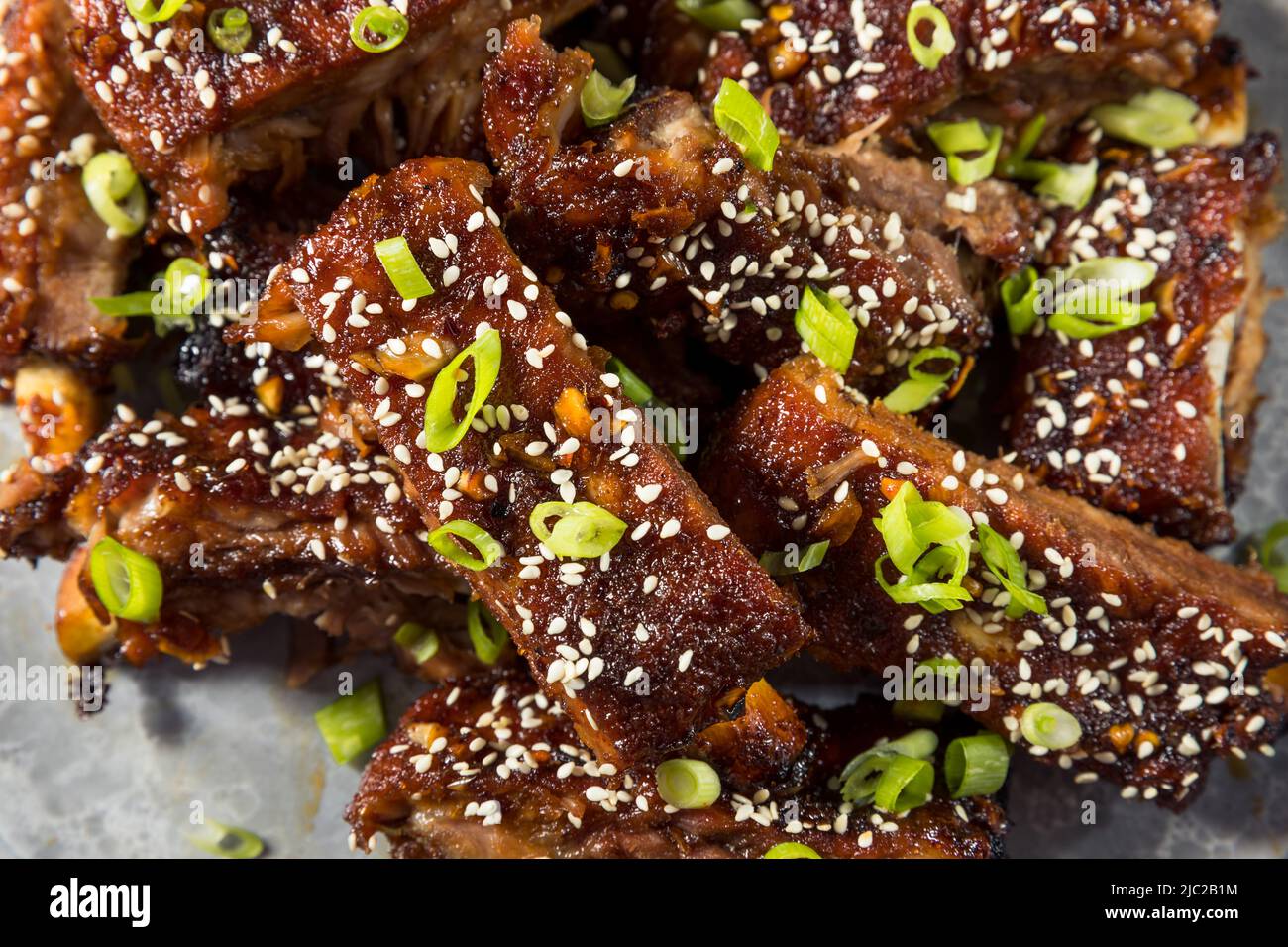 Homemade Spicy Asian Baby Back Ribs with Sesame and Green Onions Stock ...