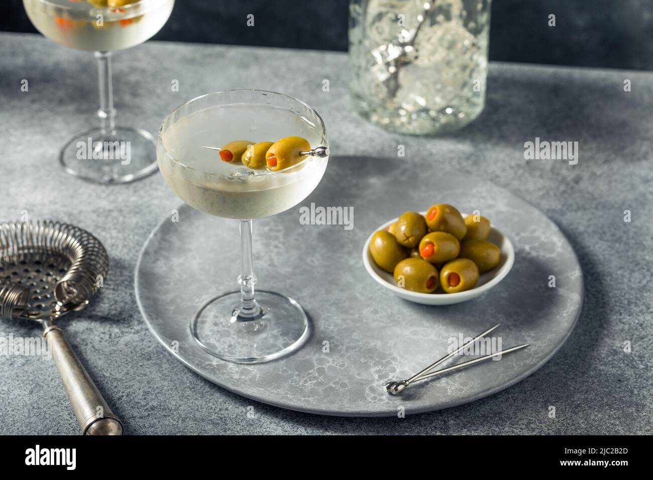 Boozy Refreshing Dry Gin Martini with Olive Garnish Stock Photo Alamy