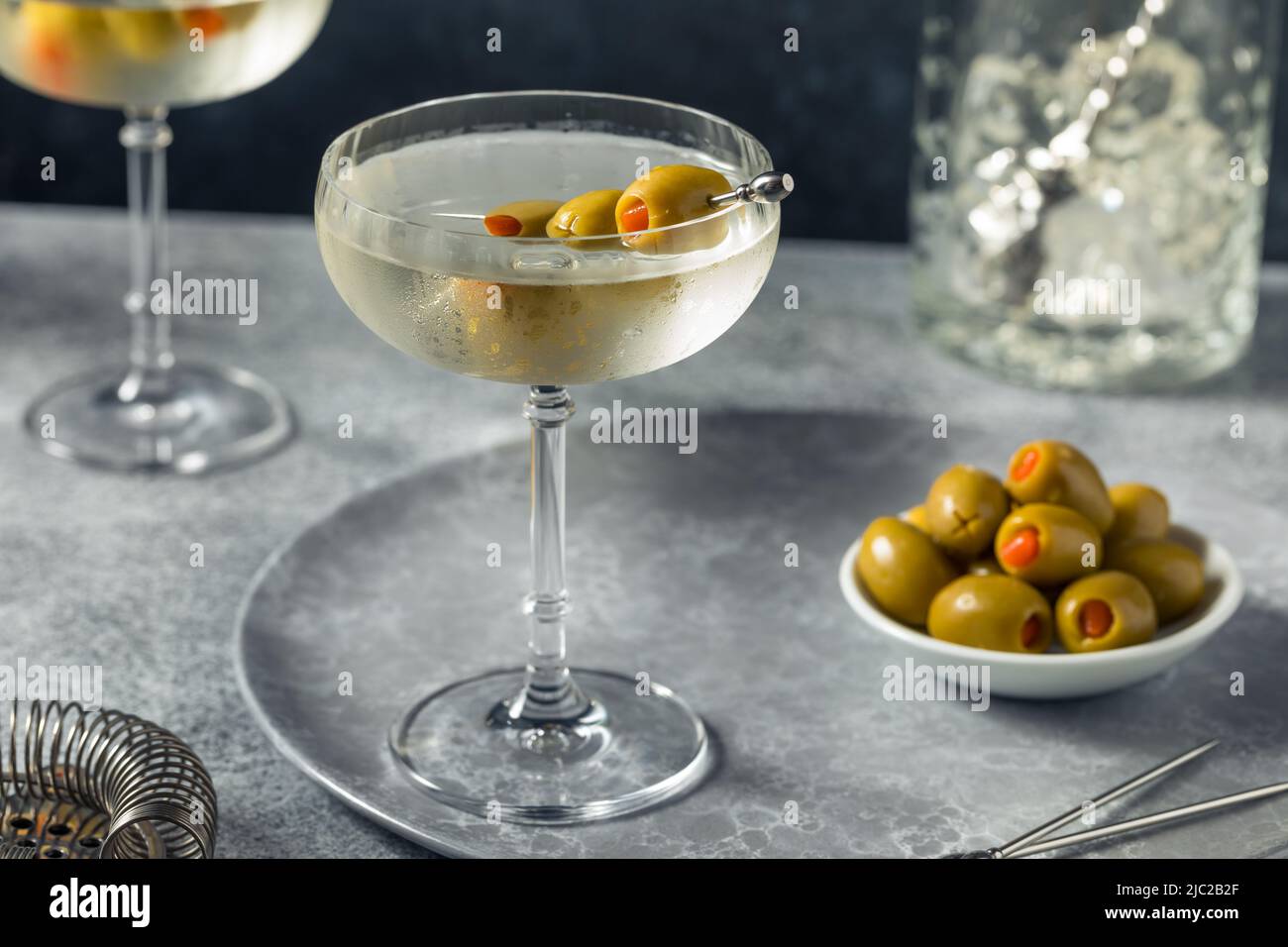 Boozy Refreshing Dry Gin Martini with Olive Garnish Stock Photo Alamy