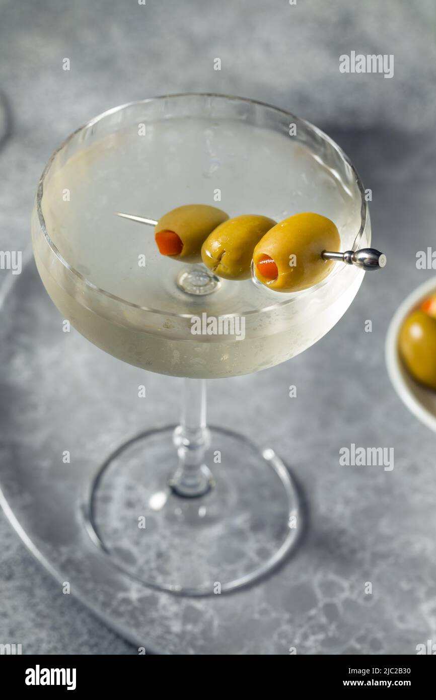 Boozy Refreshing Dry Gin Martini with Olive Garnish Stock Photo Alamy