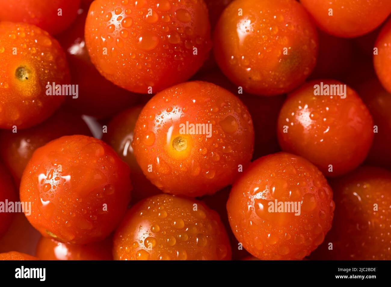 Raw Organic Red Cherry Tomatoes in a Bowl Stock Photo - Alamy