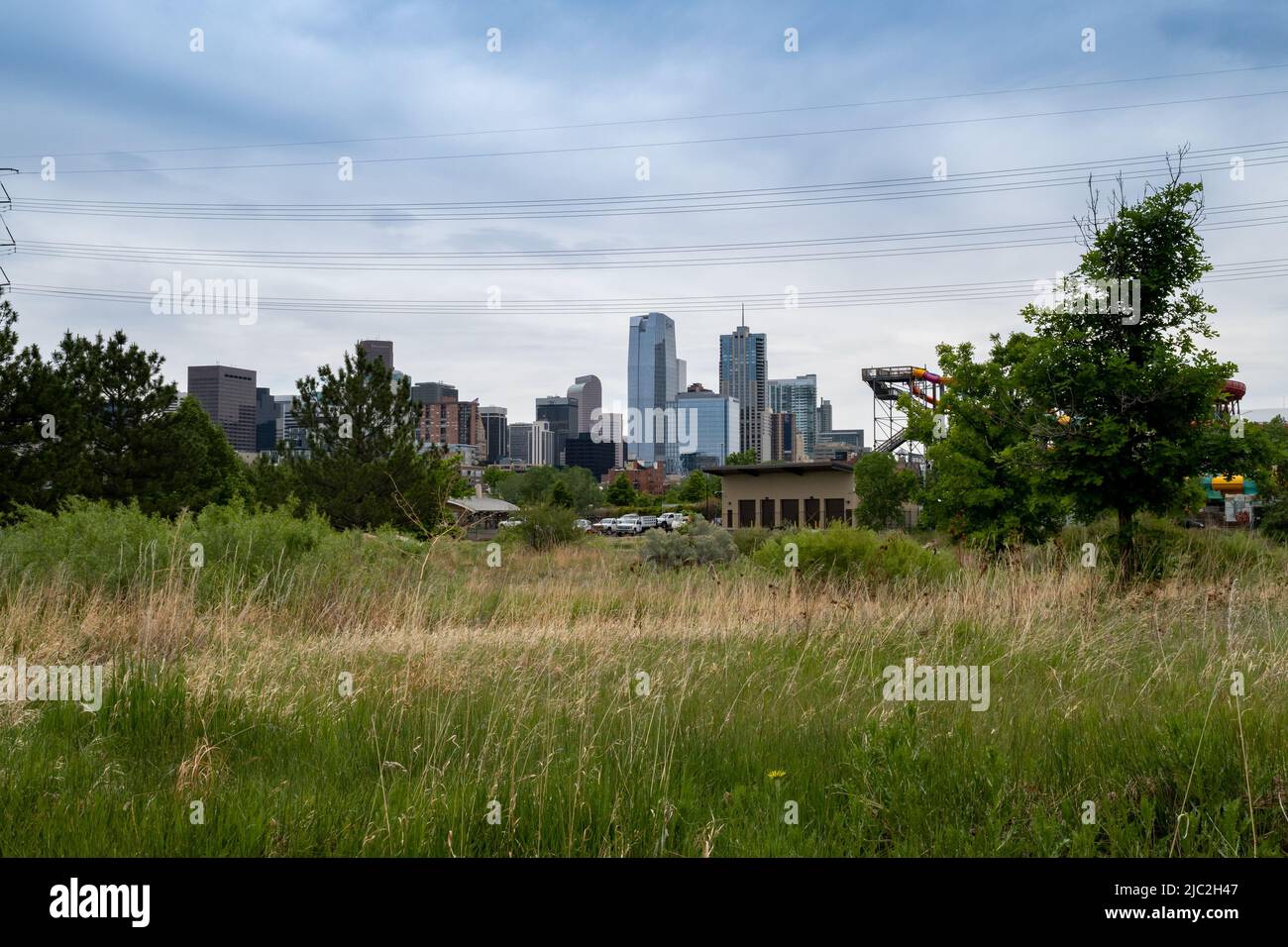 Denver, Colorado, May 28, 2022. Denver downtown skyline viewed from the South Platter River trail near the Aquarium Stock Photo