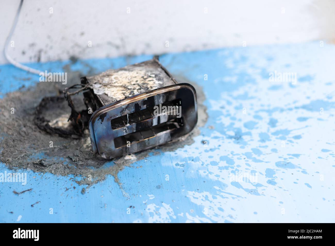 Toaster after fire. Household electrical appliance fire hazard