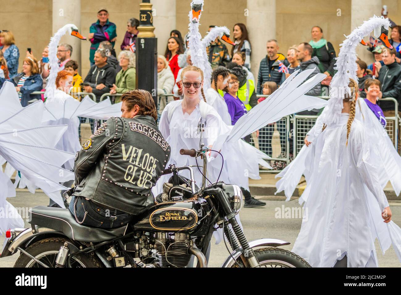 A Royal Enfield Rocker sits on his vintage motorbike, which had broken ...
