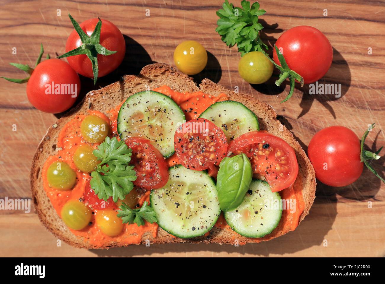 Fresh bread with cucumbers and tomatoes Stock Photo