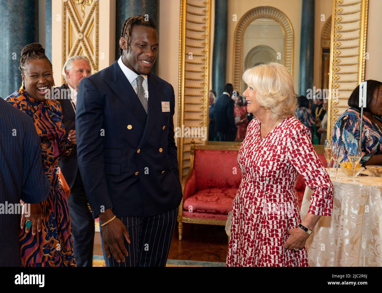Britain's Camilla, Duchess of Cornwall, speaks with rugby player Miles'Maro' Itoje, while she attends a reception celebrating the Commonwealth Diaspora of the United Kingdom, in London, Britain, June 9, 2022. Dominic Lipinski/PA Wire/Pool via REUTERS Stock Photo
