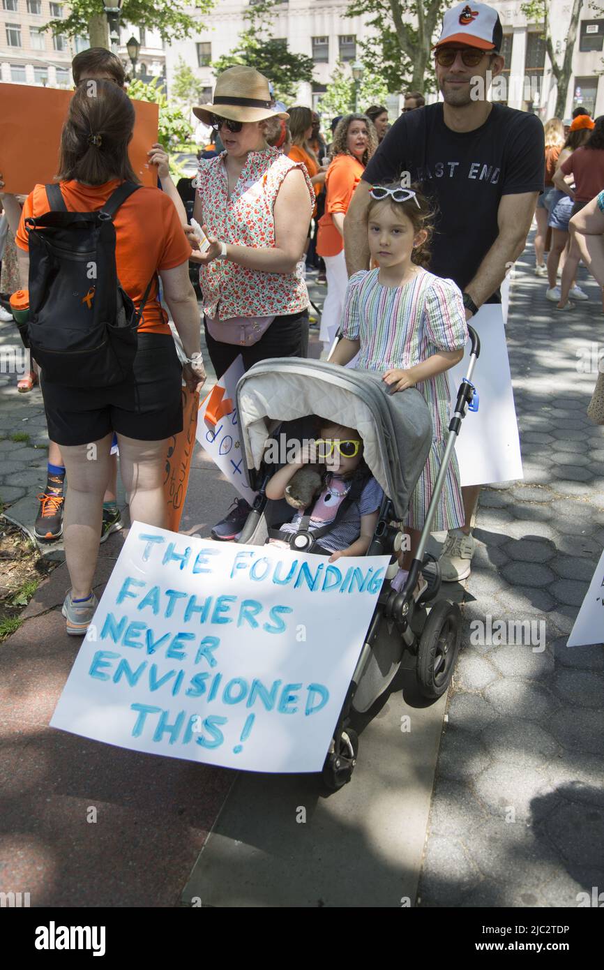Moms Demand Action  NYC commemorate Wear Orange with its Annual rally & Walk for gun law reform  in Solidarity with Survivors from gun violence from Foley Square in lower Manhattan across the Brooklyn Bridge. Stock Photo