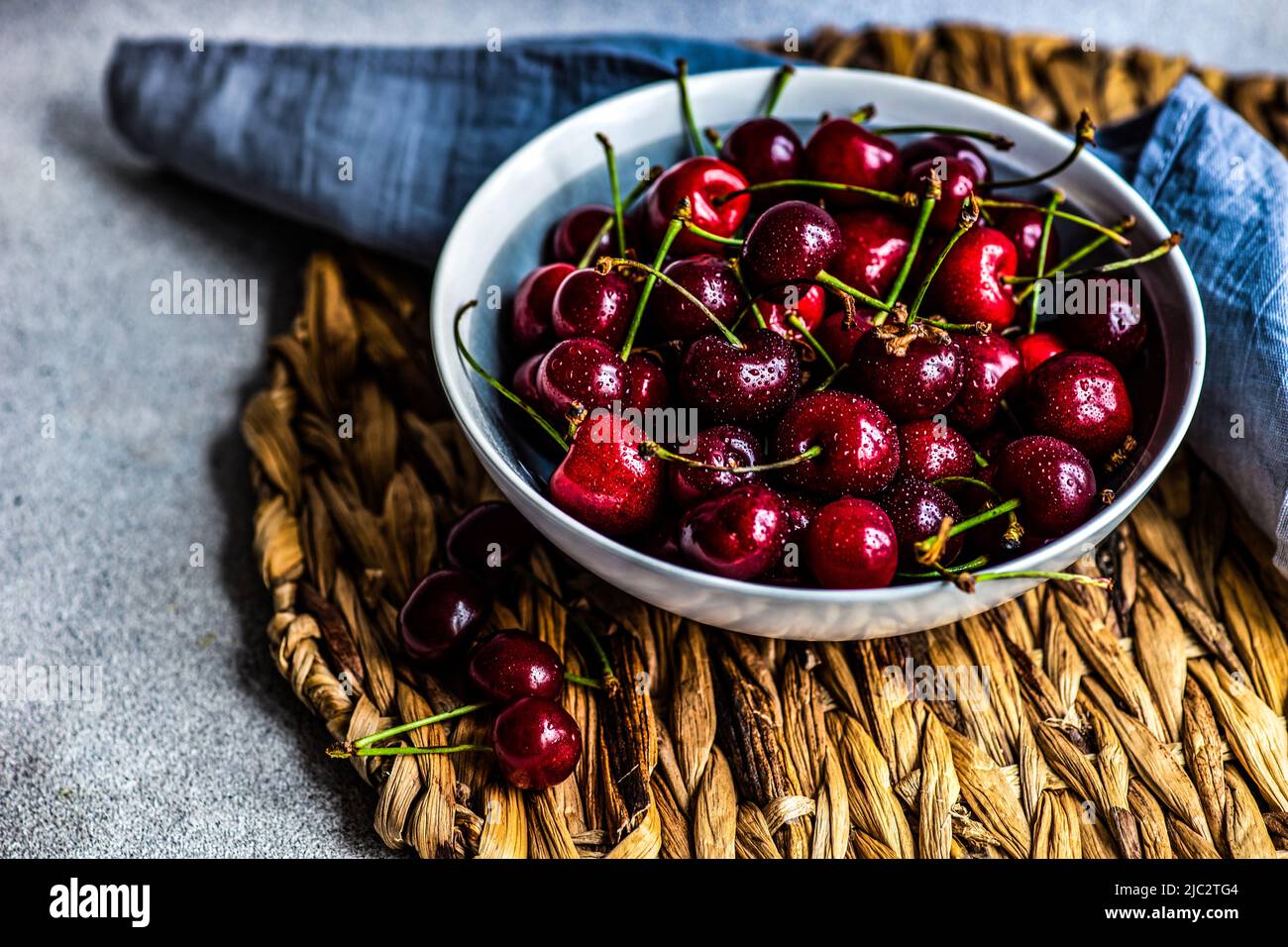 Close-Up of a bowl of organic cherries Stock Photo