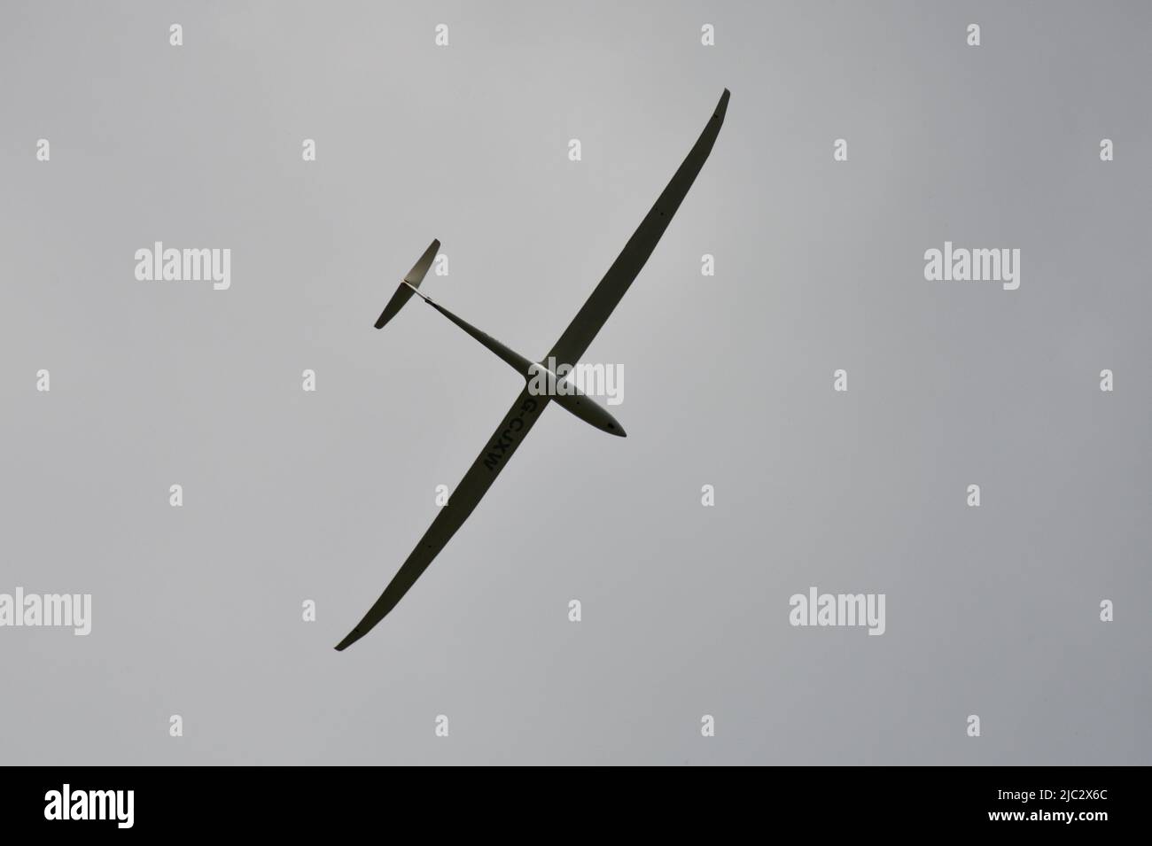 Glider over the Village of Hook Norton Oxfordshire England uk Stock