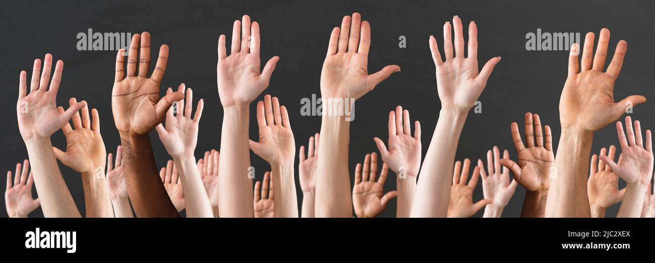 Group diverse hands raised on hi-res stock photography and images