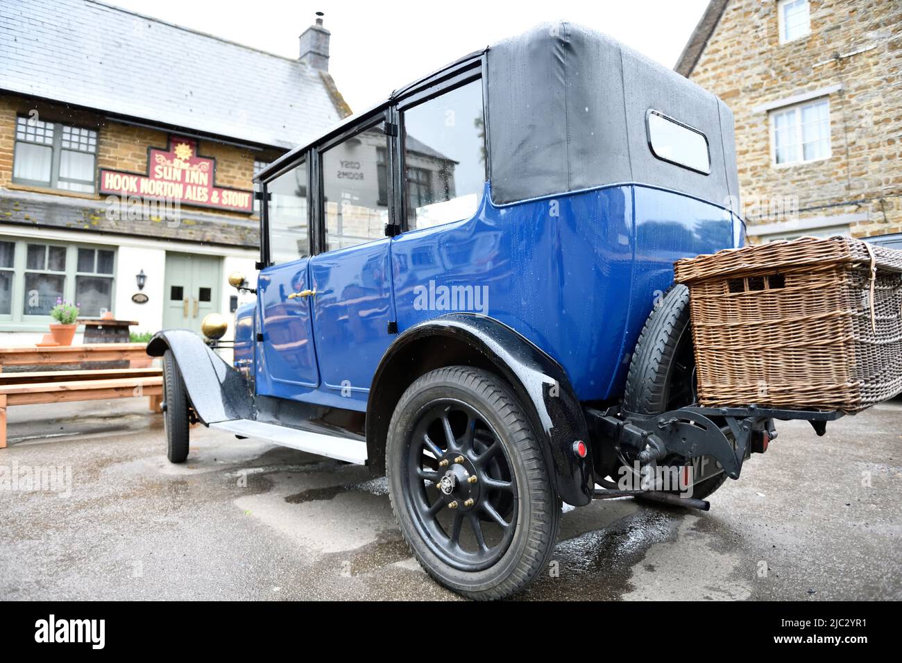 Classic Car parked at the Sun Inn Hook Norton Oxfordshire England uk