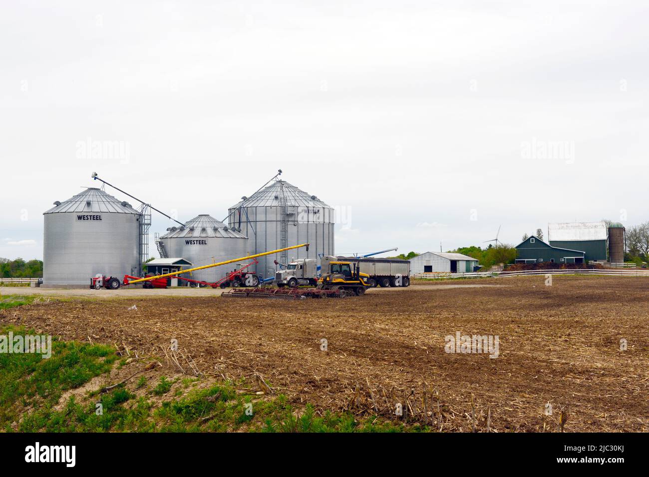 A landscape image of Westeel corrugated galvanized steel grain storage