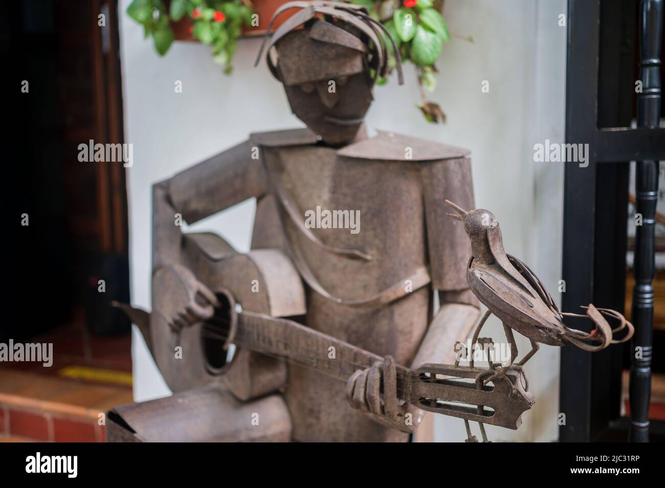 Guitar player sculpture in Getsemani, Cartagena, Colombia Stock Photo