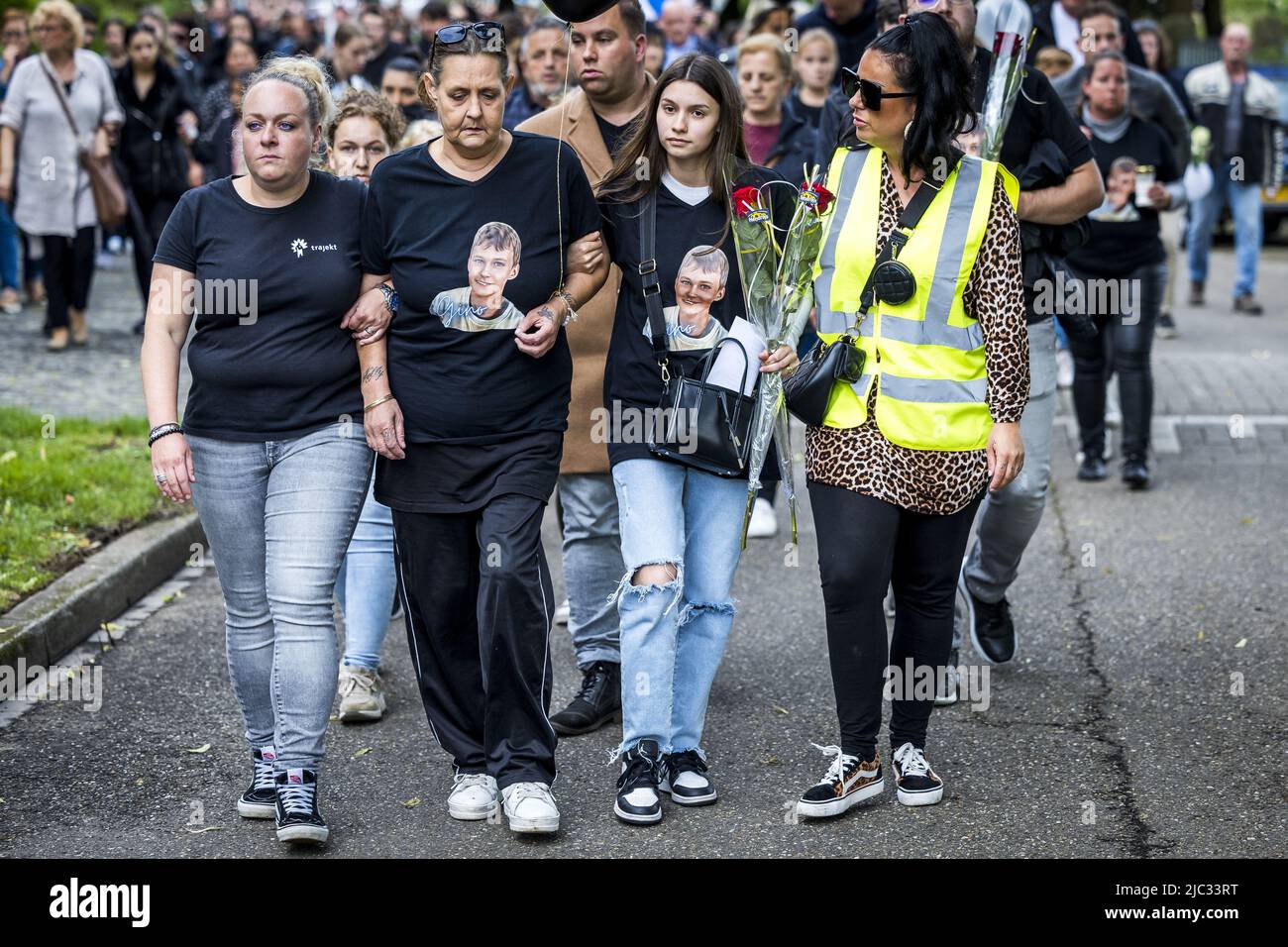 2022-06-09 18:48:06 MAASTRICHT - Relatives join a silent march in memory of 9-year-old Gino in the neighborhood where he lived. The boy disappeared from a playground on June 1, and his remains were found a few days later at a house. A 22-year-old suspect has been arrested. ANP MARCEL VAN HOORN netherlands out - belgium out Stock Photo