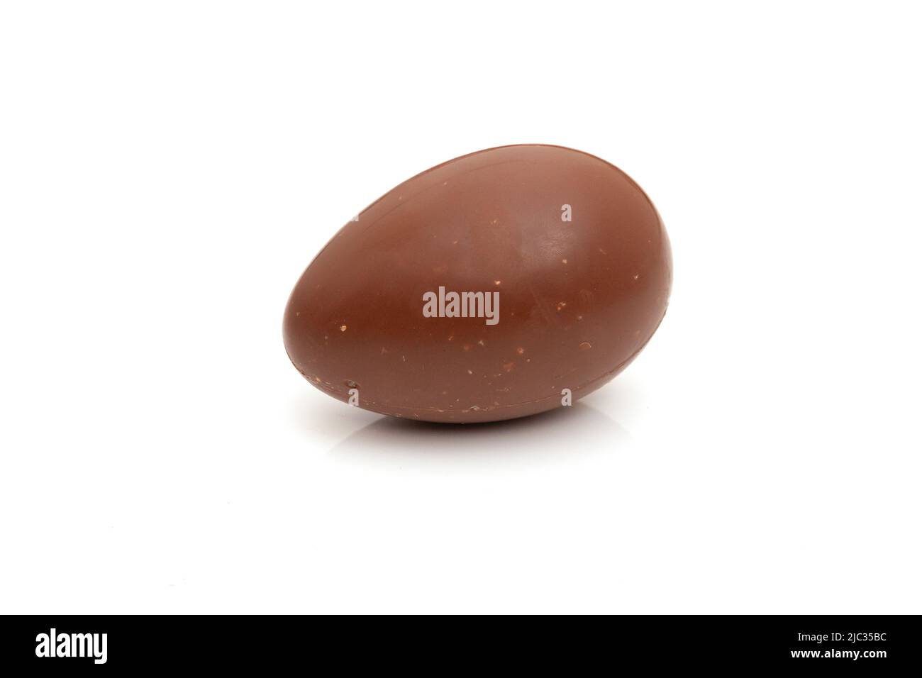 Chocolate egg isolated on a white studio background. Stock Photo