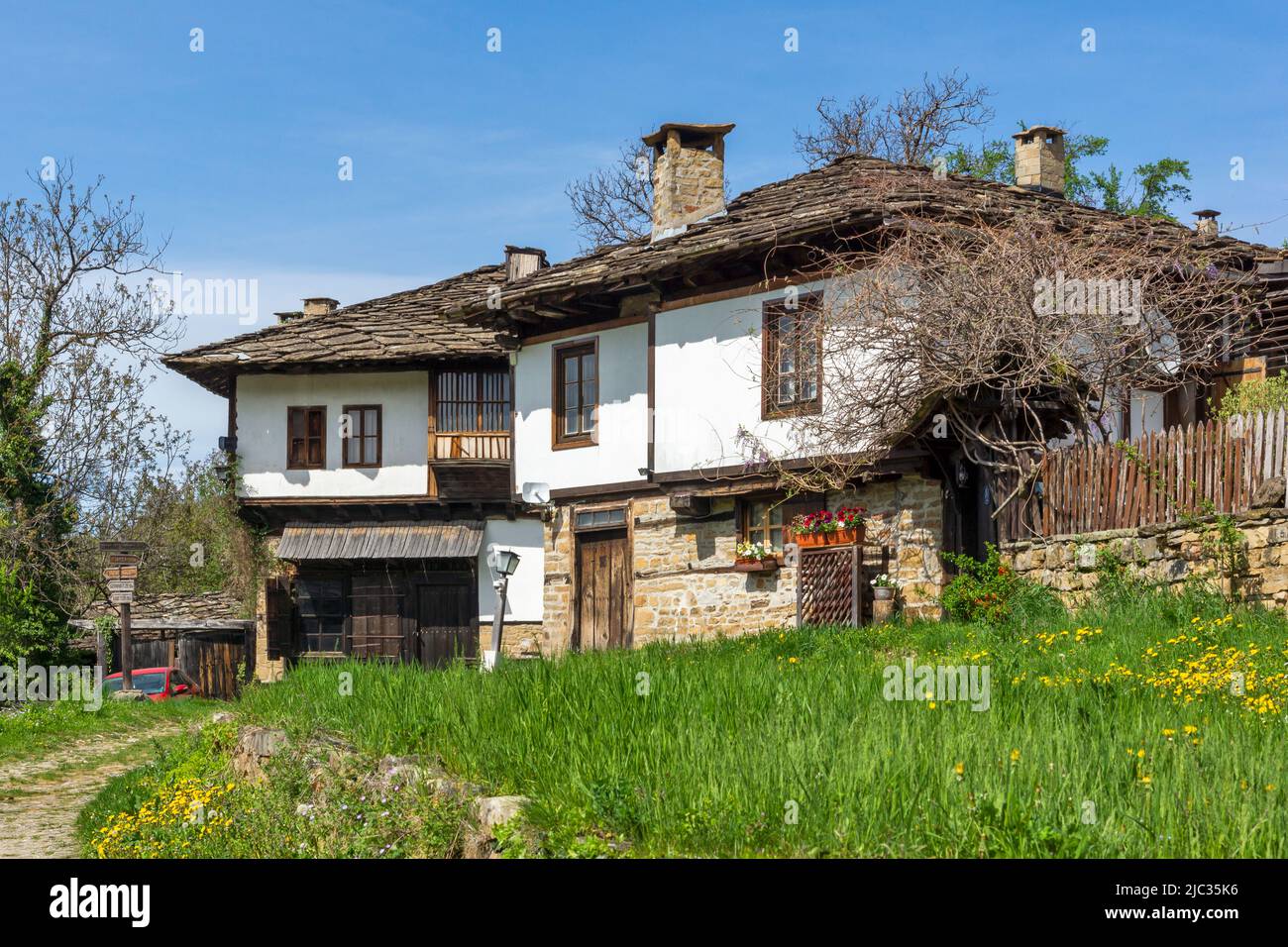 Typical street and old houses at historical village of Bozhentsi ...