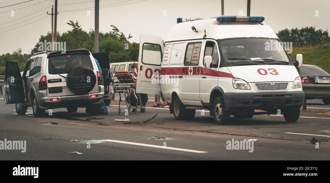 Russia, 2022: Emergency 03 team working in highway on car accident Stock Photo