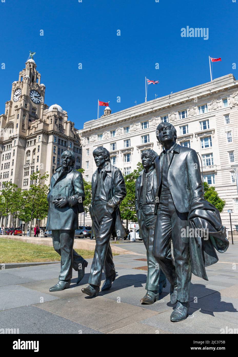 The Beatles statue, Royal Liver Building and Cunard Building, Pier Head, Liverpool, England, UK Stock Photo