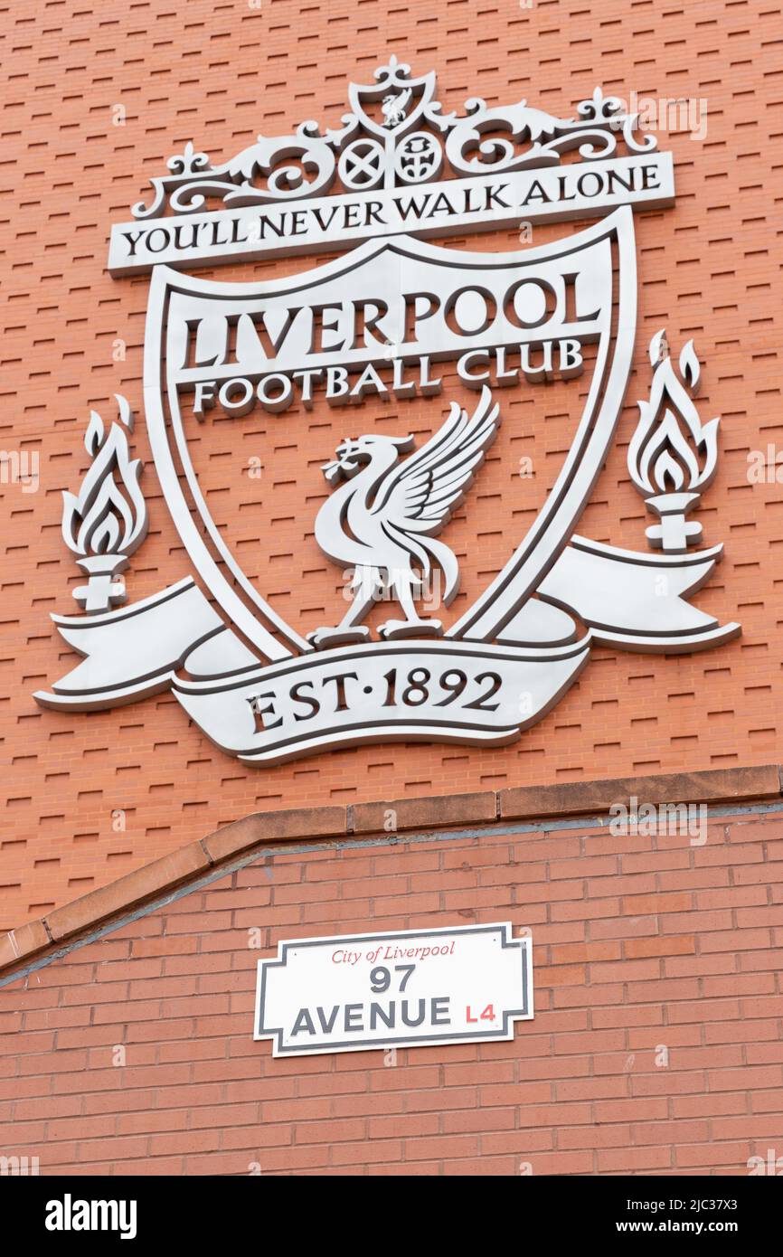 Liverpool football club crest and 97 Avenue sign on wall of Anfield Stadium, Liverpool, England, UK Stock Photo
