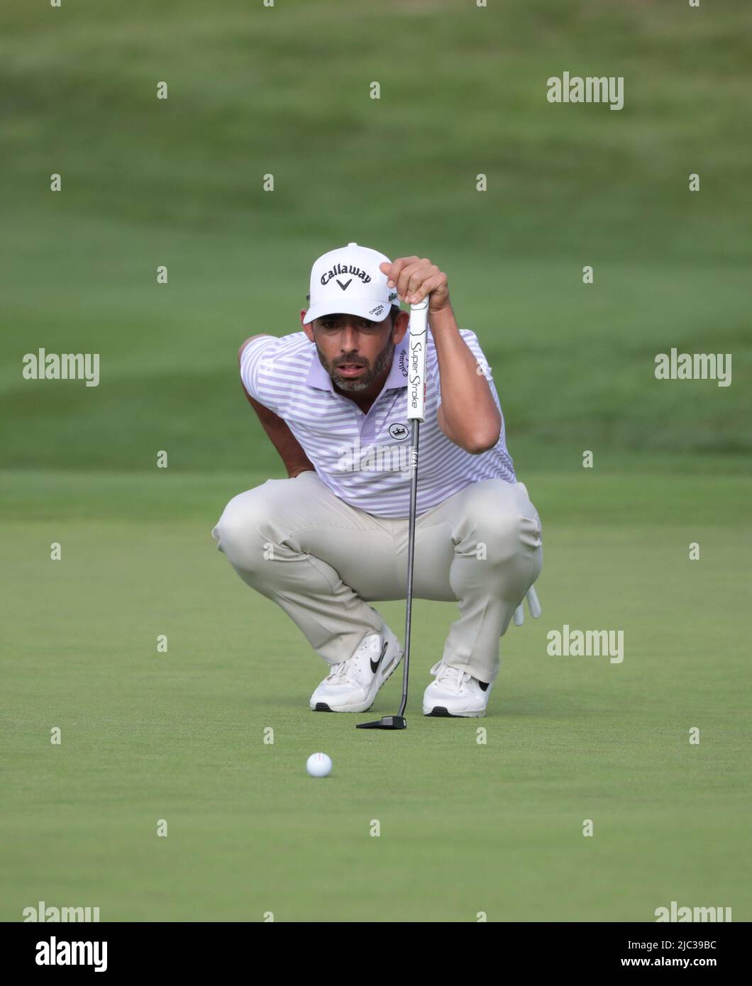 London, UK. 09th June, 2022. South Africa's Charl Schwartzel lines up a putt on the 18th green during the first round of the inaugural LIV Golf event at the Centurion club in Hertfordshire on Thurssday, June 09, 2022.The event is 12 teams of four players competing over 54 holes for a prize pot of $25million dollars to the winning team. Photo by Hugo Philpott/UPI Credit: UPI/Alamy Live News Stock Photo