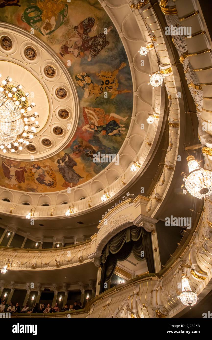 View of a chandelier and the ceiling paintings by artist Leon Bakst on ...