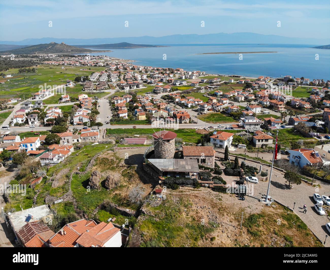 Windmill aerial. Cunda Island view from top. Old windmill on Cunda island of Turkey Stock Photo