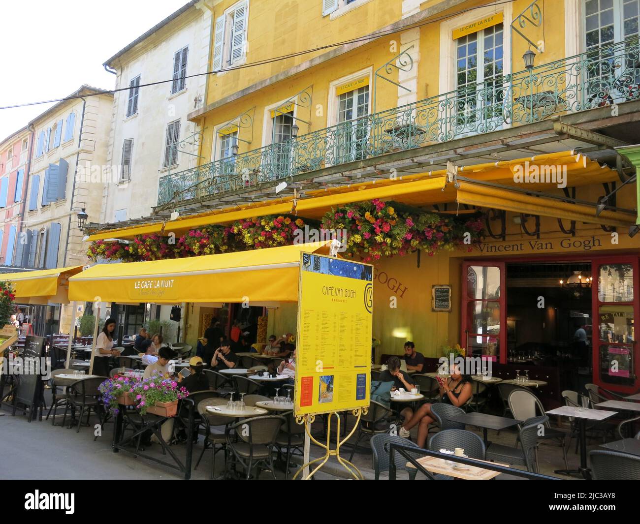The inspiration for a 1888 painting by the famous French painter, the Café Van Gogh in Arles is still a Provencal eatery with tables on the terrace. Stock Photo