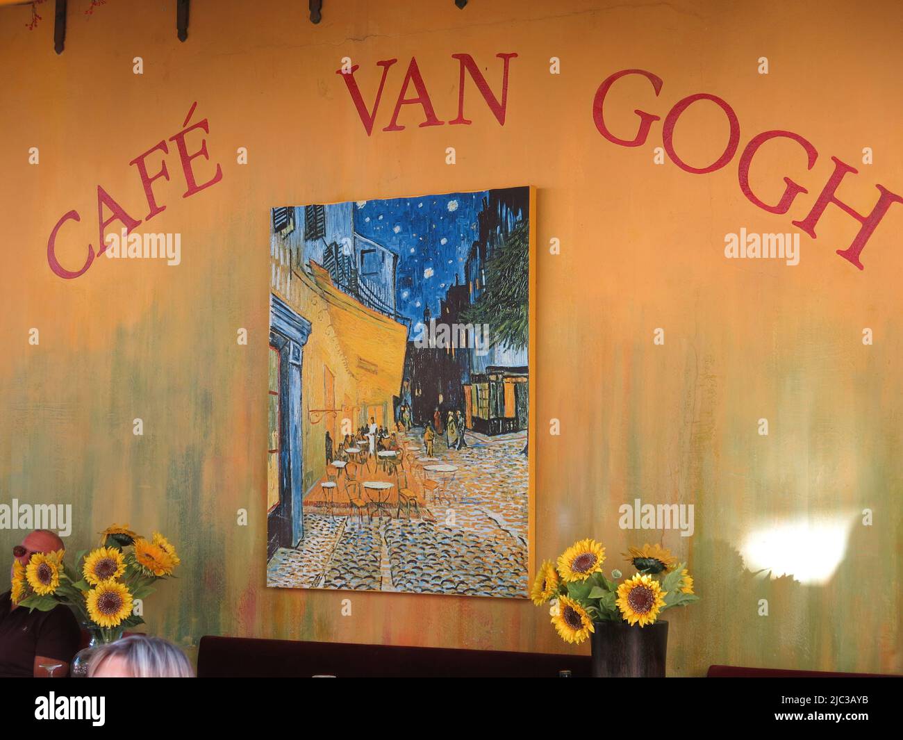 The inspiration for a 1888 painting by the famous French painter, the Café Van Gogh in Arles is still a Provencal eatery with tables on the terrace. Stock Photo