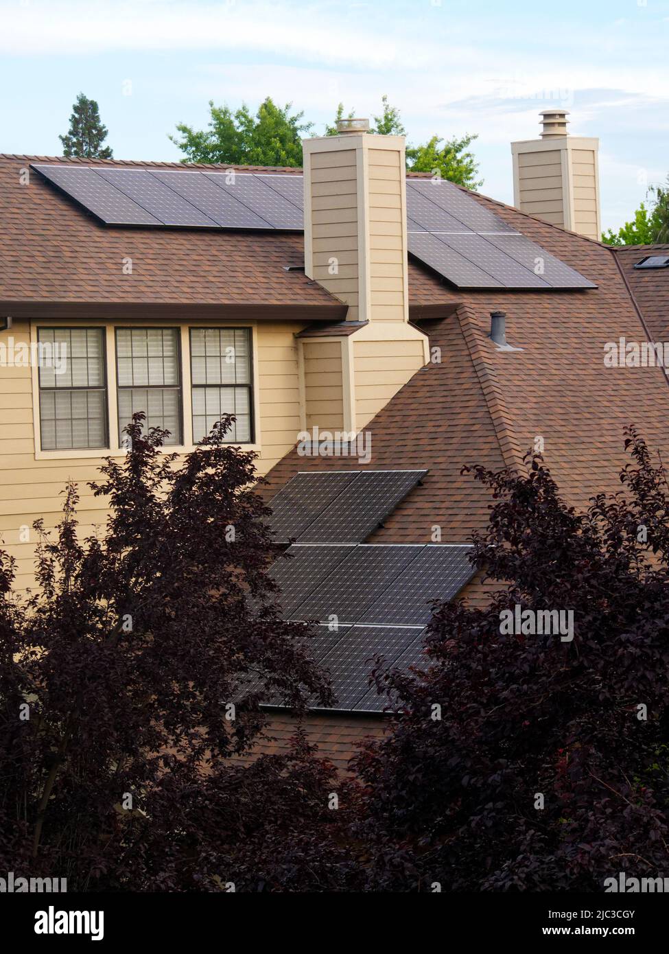 Homes with solar panels cause the energy providers problems by reducing their profits. Photo i Sacramento California shows home with solar panels that feed electricity into the grid. Utility companies want to charge homeowners $50 USD fee for giving them electricity. Florida's governor veto a bill the legislature passed to prevent homeowners from getting paid at the same rate as they are being billed for electricity. Stock Photo
