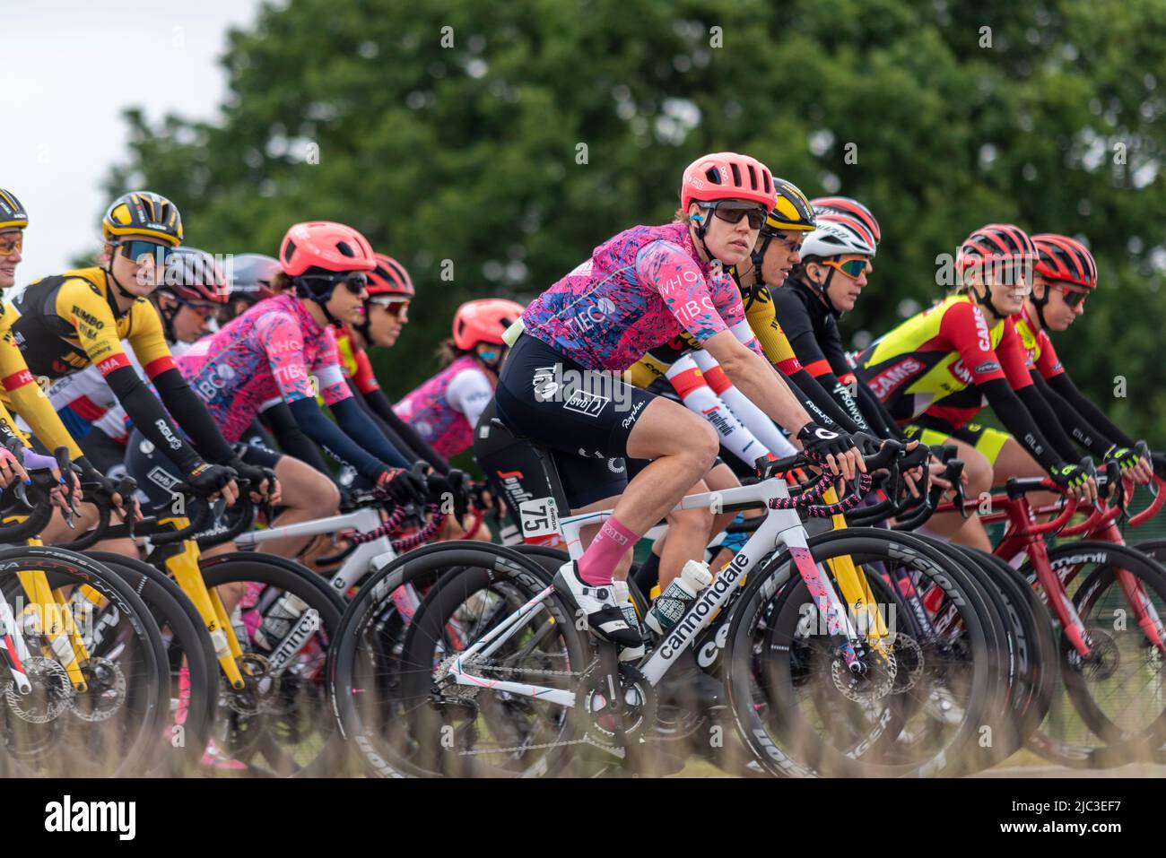 Cyclists at Colchester Sports Park racing in the UCI Women’s Tour cycle race Stage 1 heading out into Essex countryside. Tanja Erath (75) of EF Stock Photo