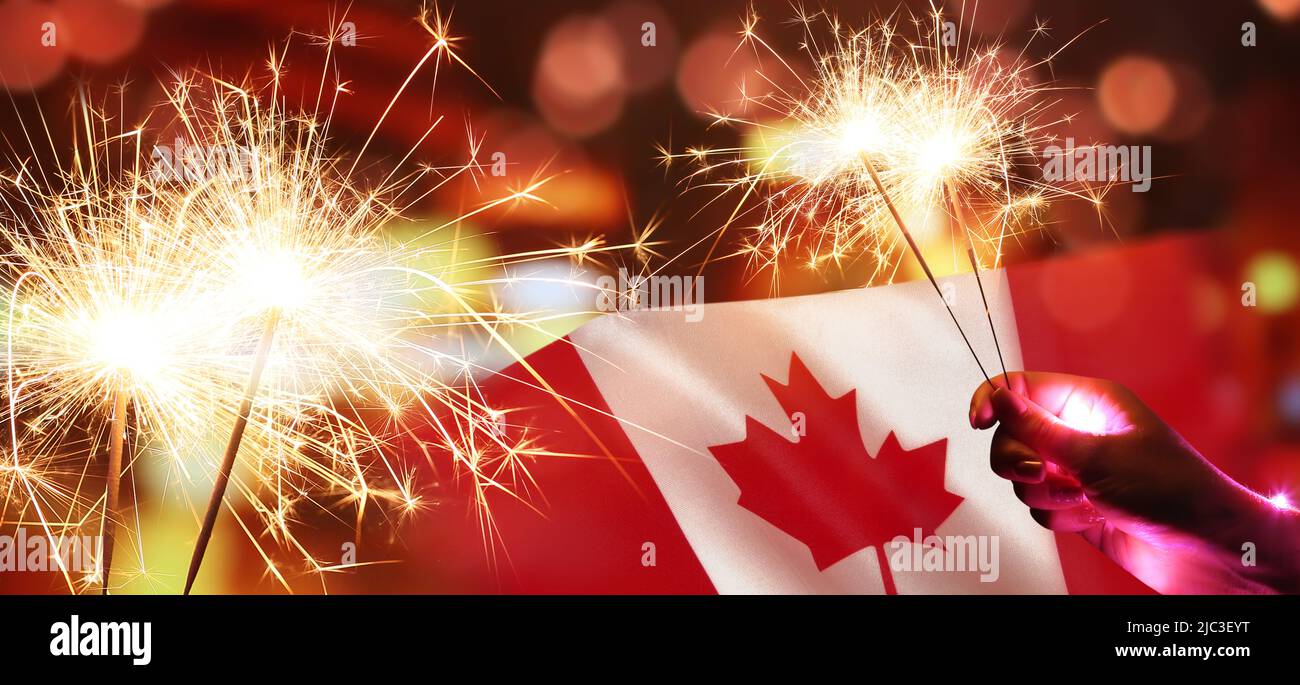 Collage with Canadian flag and sparklers. Canada Day celebration Stock Photo - Alamy