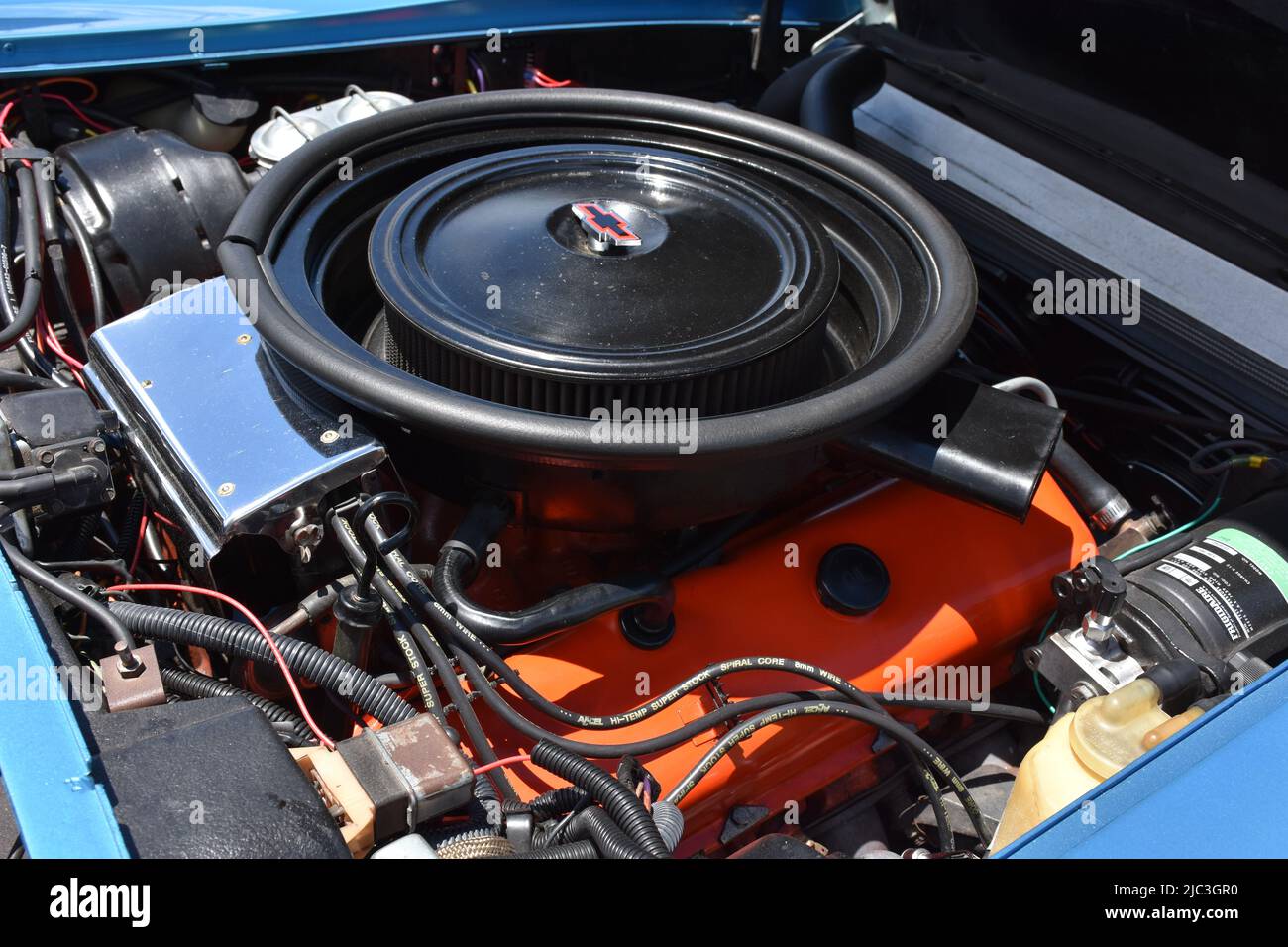 The 454 Engine of a 1974 Chevrolet Corvette on display at a car show. Stock Photo