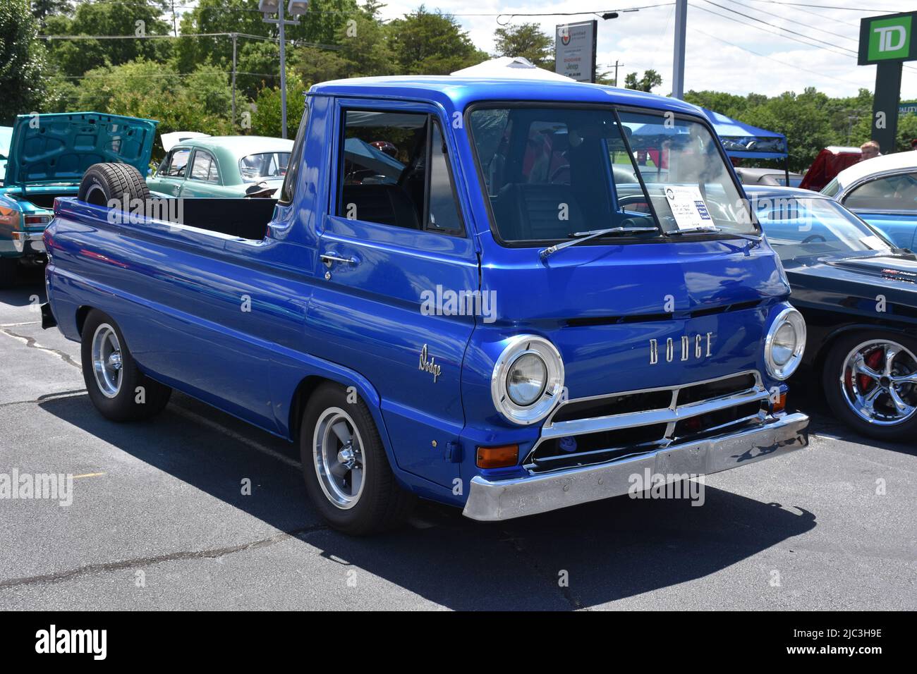 A blue 1966 Dodge Pickup Truck on display at a car show. Stock Photo