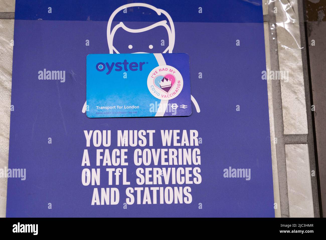 Signage asking people "you must wear a face covering on tfl services ...