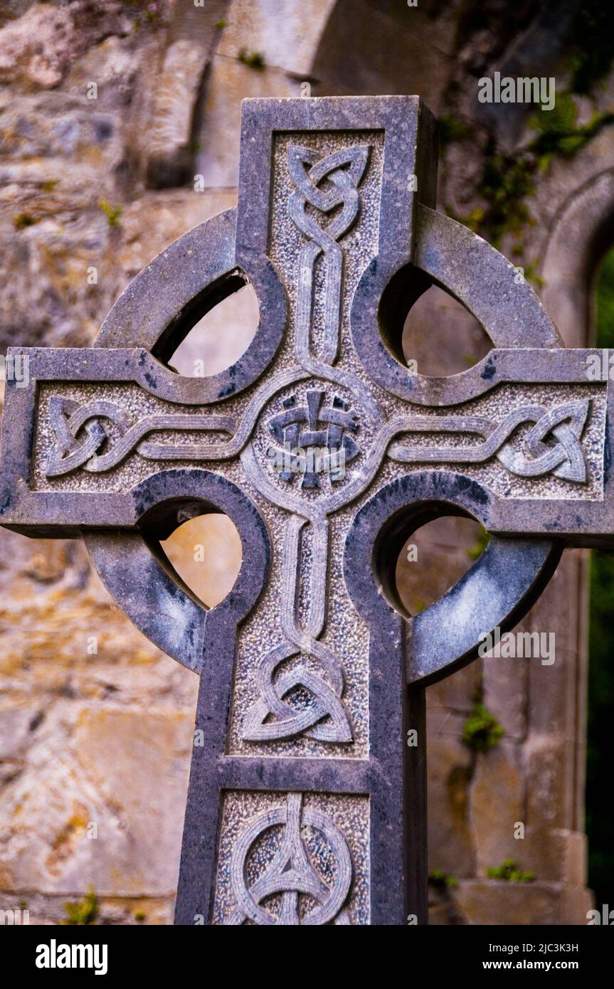 Cross with Celtic circle and knots at Cong Abbey ruins in Cong, Ireland. Stock Photo