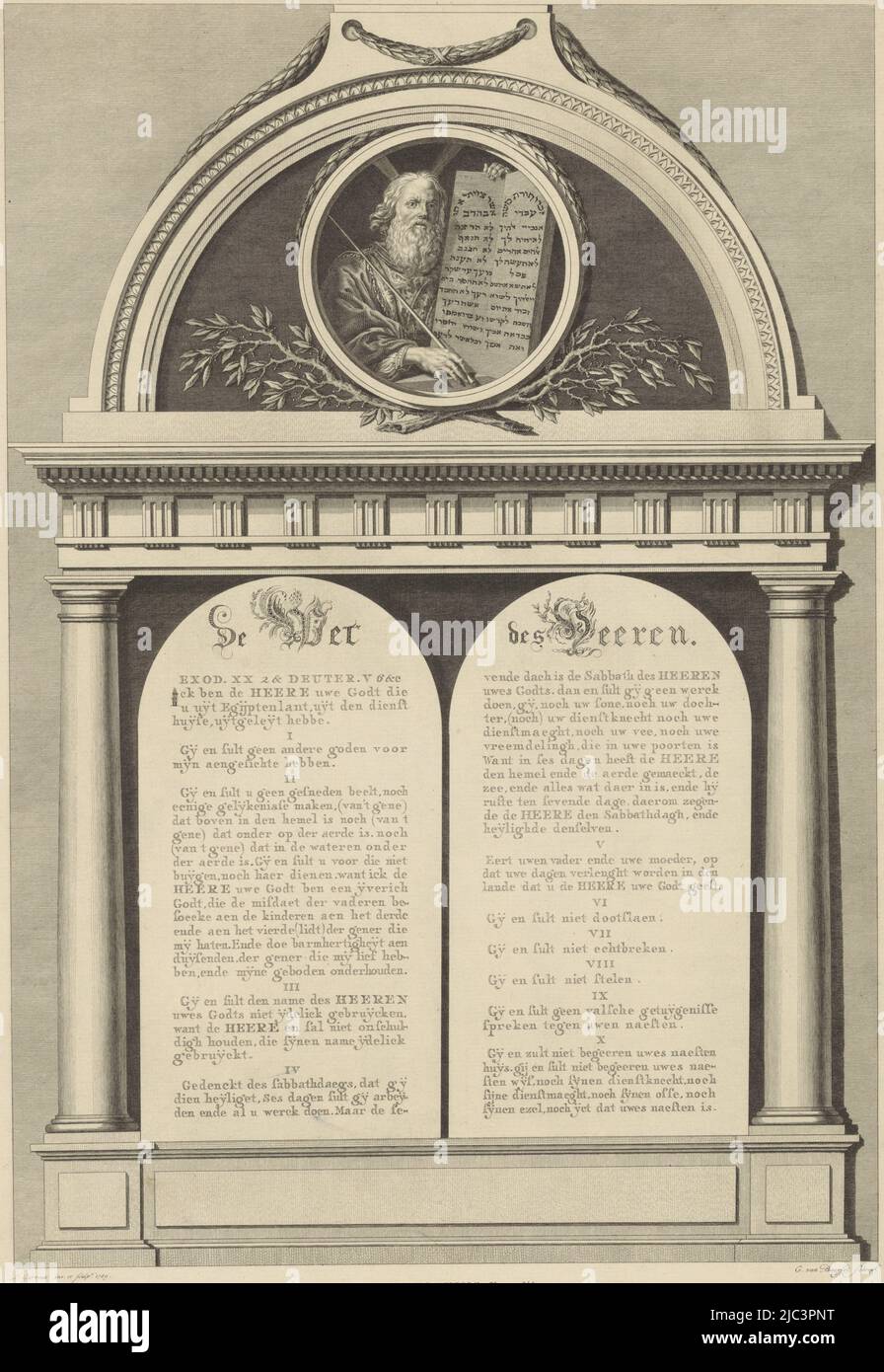 The two stone tablets with the ten commandments in calligraphy. Centrally at top in a round medallion: Moses with the ten commandments, Moses and the ten commandments, print maker: Louis E.F. Garreau, (mentioned on object), Louis E.F. Garreau, (mentioned on object), Cornelis van Baarsel, (mentioned on object), Amsterdam, 1789, paper, etching, engraving, h 482 mm × w 338 mm Stock Photo