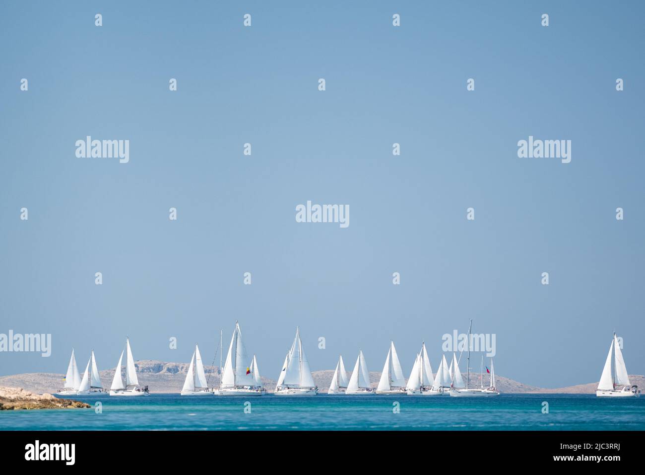 Water sports, Sailing yacht group regatta race on sea near Vodice in Croatia, Adriatic sea Stock Photo