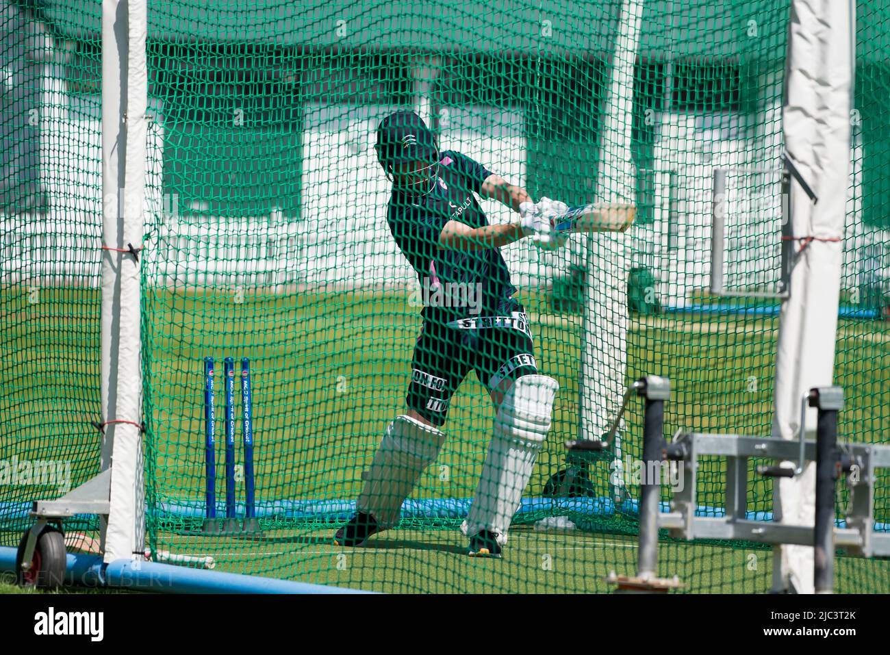 Toby Roland Jones bats in a net during a Middlesex Training session on the 17th of May 2022 Stock Photo