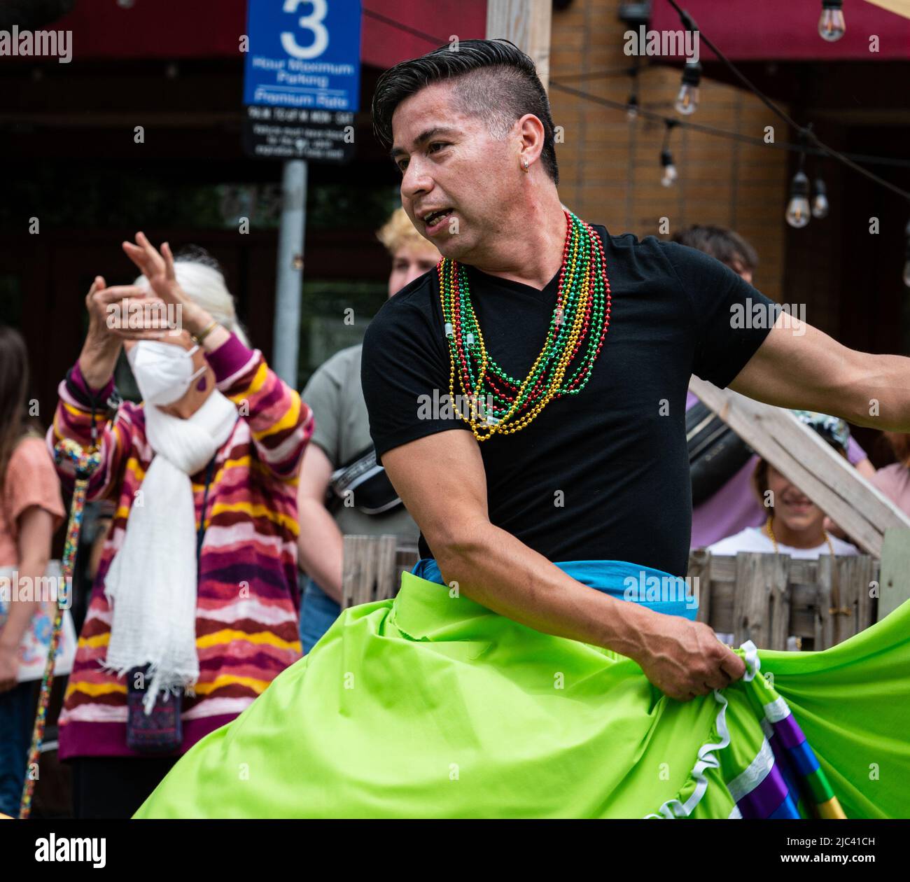 Portrait of a dancer from Ensamble Folclorico Colibri performing during the Sonoma County Pride parade in downtown Santa Rosa. Stock Photo