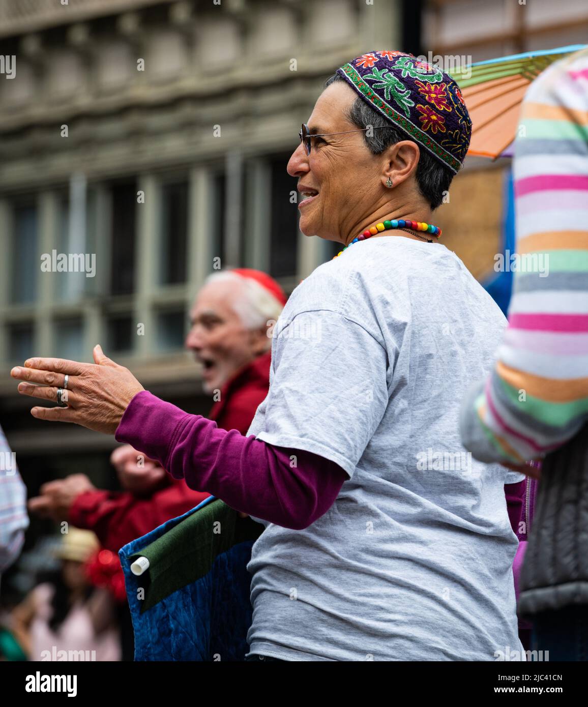 Photo of a woman wearing a yarmulke as part of a Jewish contingent in the Sonoma County Pride parade. Stock Photo