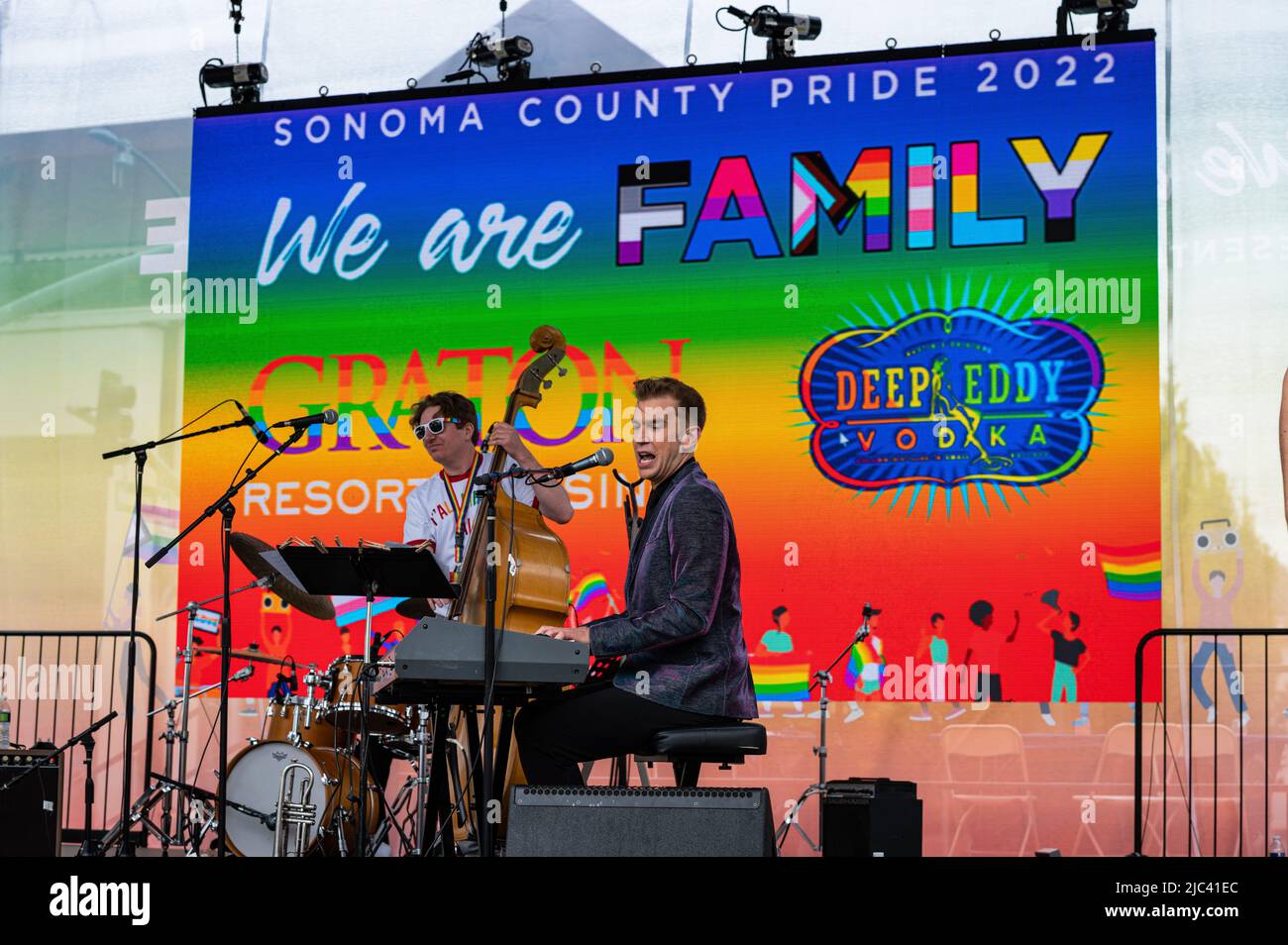 Photo of jazz singer and songwriter Spencer Day singing at the Sonoma County Pride festival.  Spencer jokes that he is the “gayer John Mayer,” Stock Photo