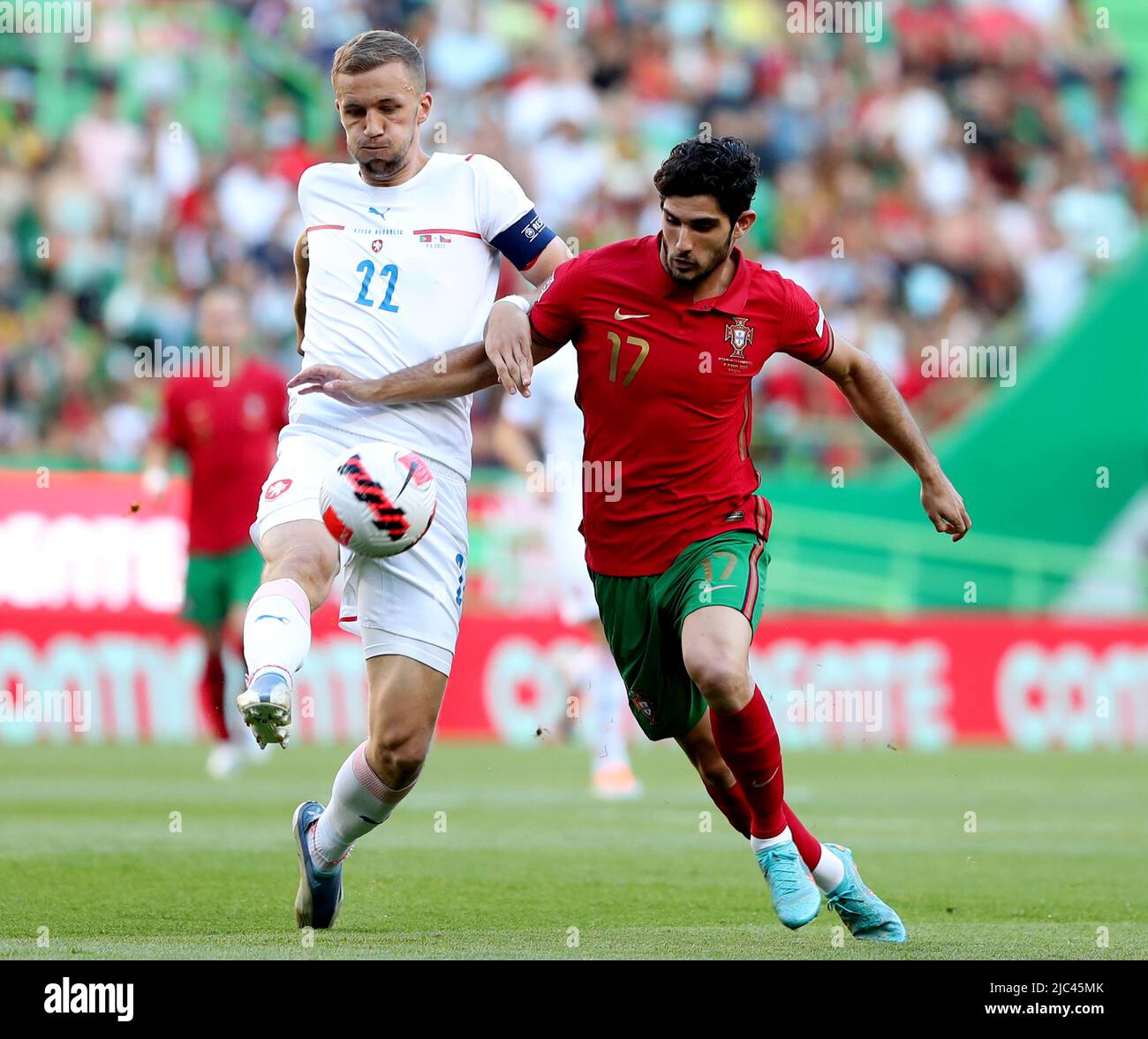 Lisbon, Portugal. 9th June, 2022. Tomas Soucek (L) of the Czech Republic vies with Goncalo Guedes of Portugal during their UEFA Nations League league A football match at the Jose Alvalade stadium in Lisbon, Portugal, on June 9, 2022. Credit: Pedro Fiuza/Xinhua/Alamy Live News Stock Photo