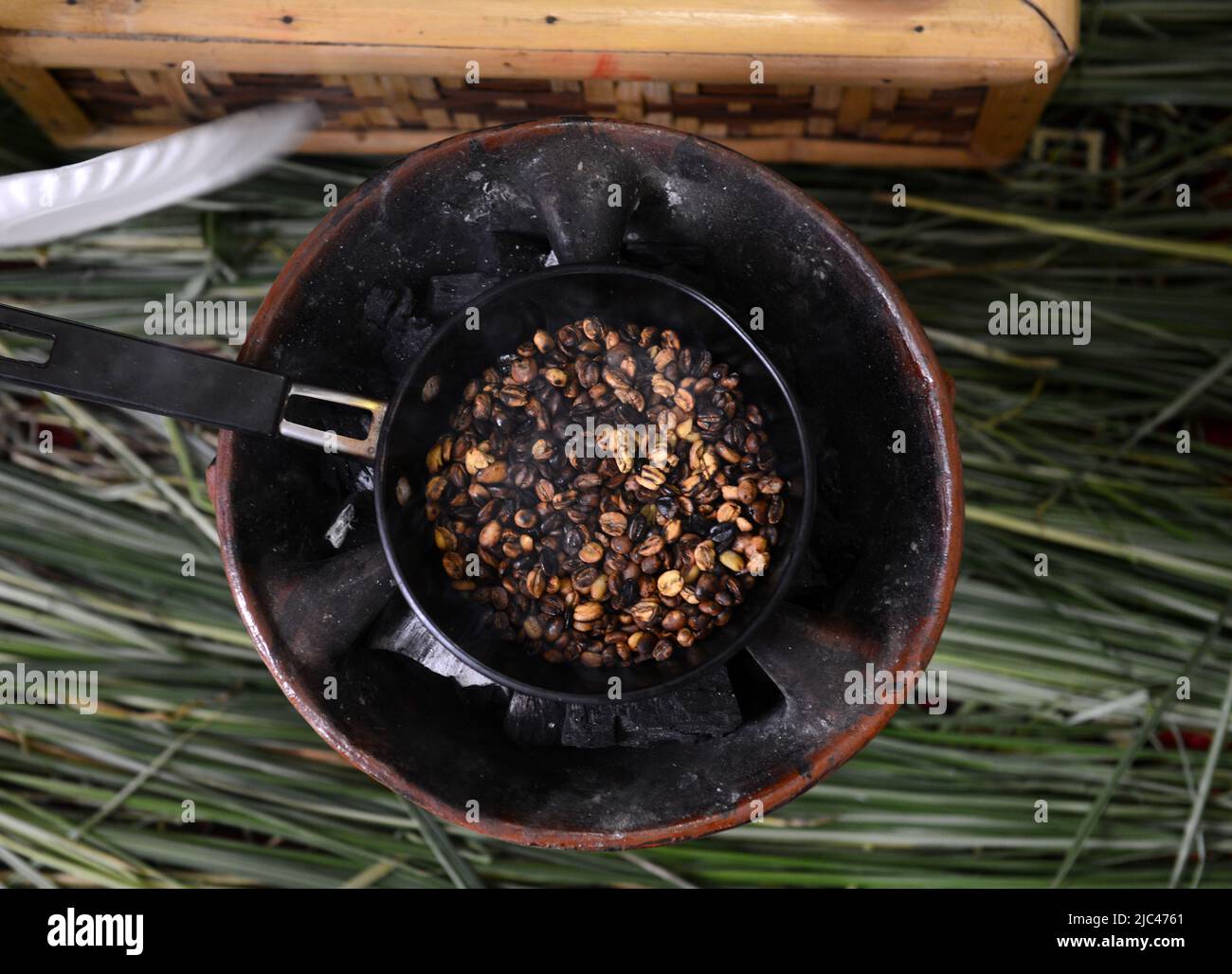 Roasting coffee beans in a traditional Ethiopian coffee ceremony Stock