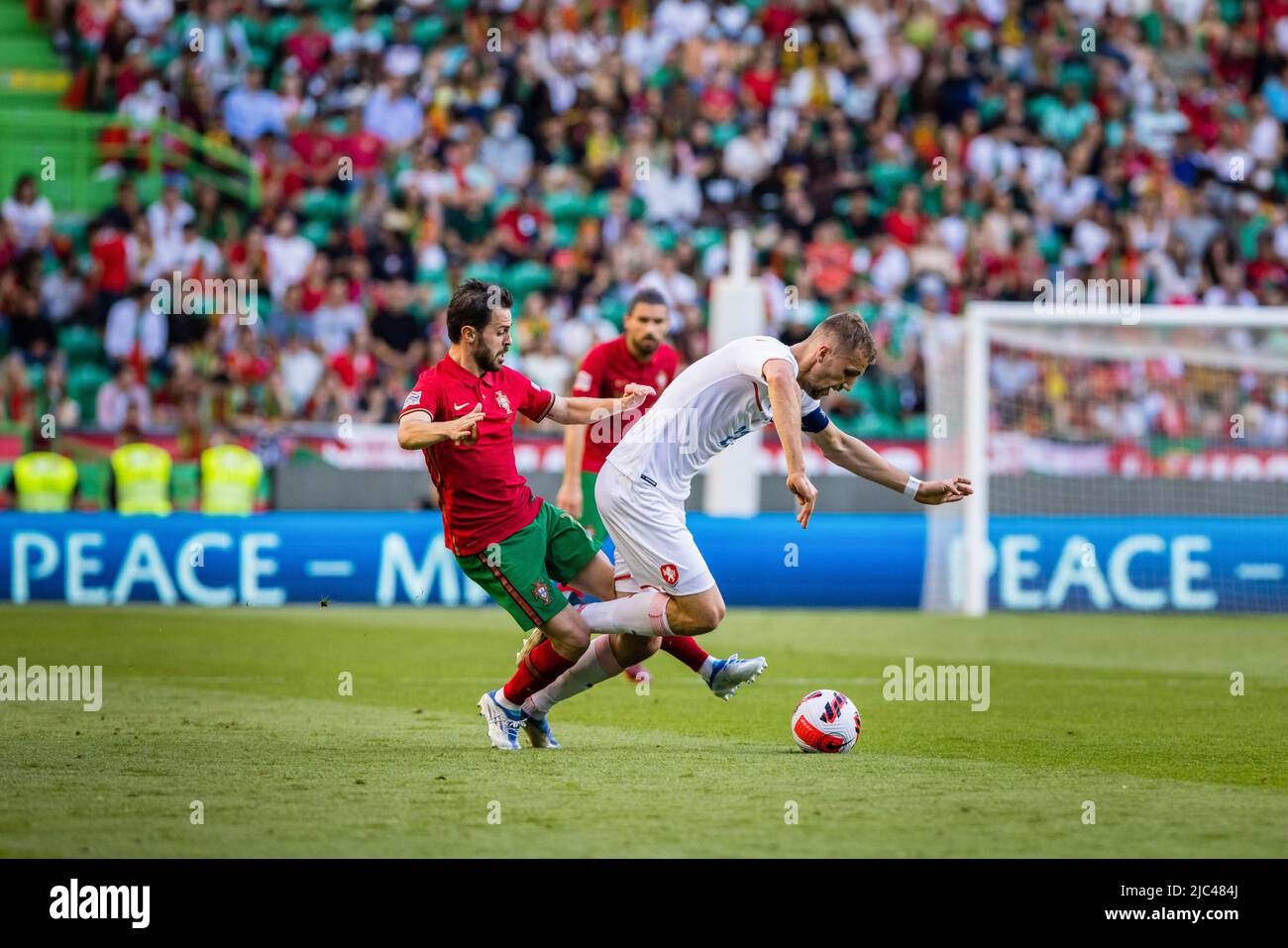 Lisbon, Portugal. 09th June, 2022. Bernardo Silva of Portugal (L) and Tomas Soucek of Czech Republic (R) seen in action during the UEFA Nations League, League A group 2 match between Portugal and Czech Republic at the Jose Alvalade stadium. (Final score; Portugal 2:0 Czech Republic) Credit: SOPA Images Limited/Alamy Live News Stock Photo