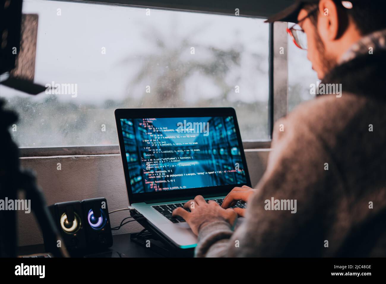 Web programmer working from home Stock Photo - Alamy image.
