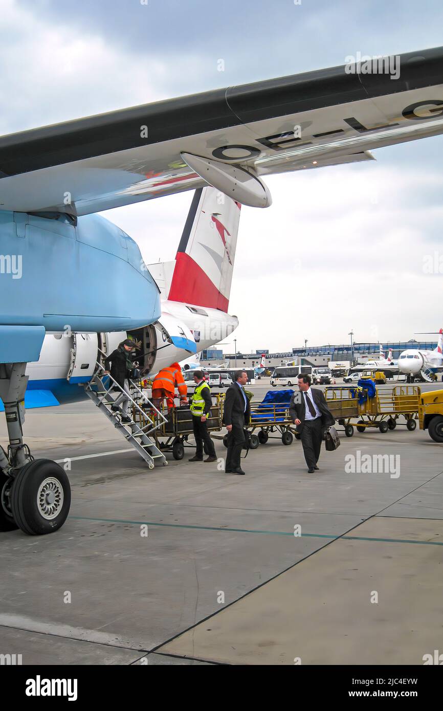 Passengers and luggage arriving at Vienna International Airport with Austrian Airlines, Austria Stock Photo