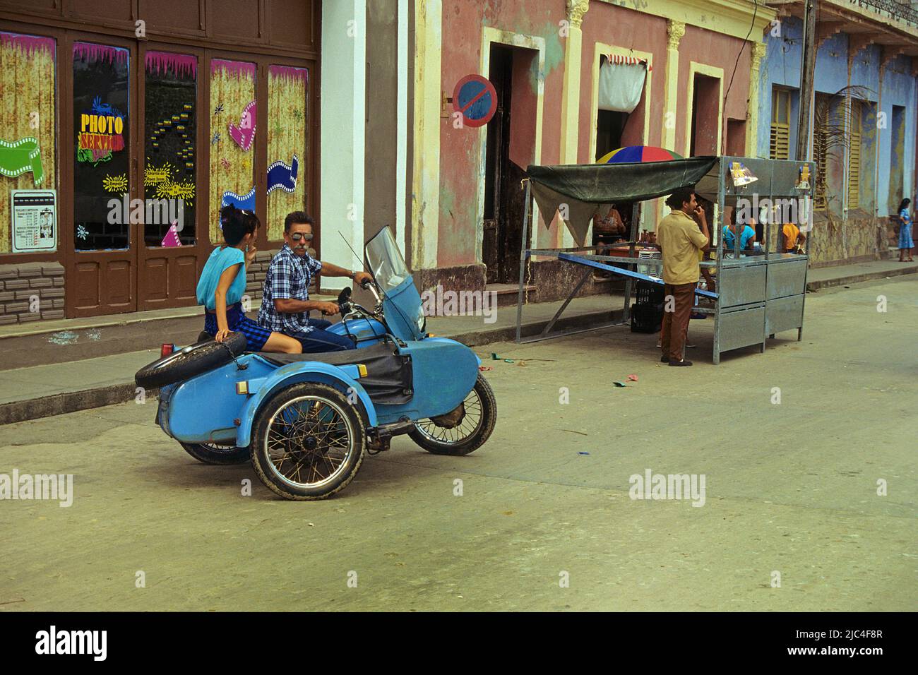 Street scene, motorbike with sidecar on a street in Trinidad, Unesco World Heritage Site, Cuba, Caribbean Stock Photo