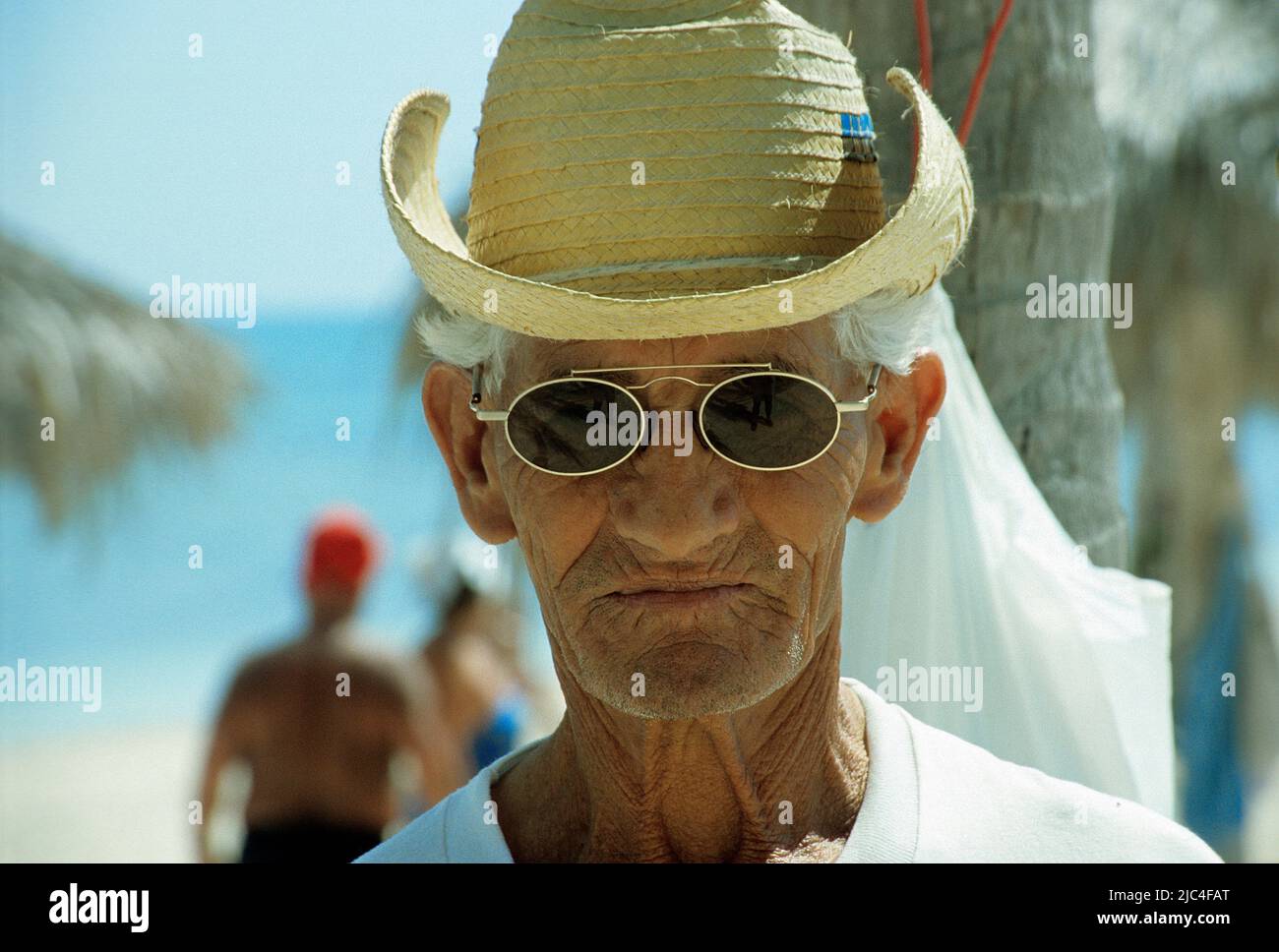 Elderly cuban with strawhat and sunglass, portrait, Pinar del Rio, Cuba, Caribbean Stock Photo